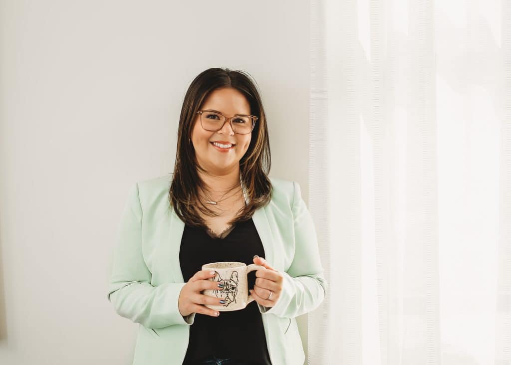 Woman smiling ready to connect with you on your child's IEP journey.